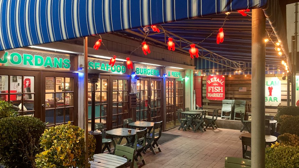 Seafood restaurant exterior with market-style frontage.
