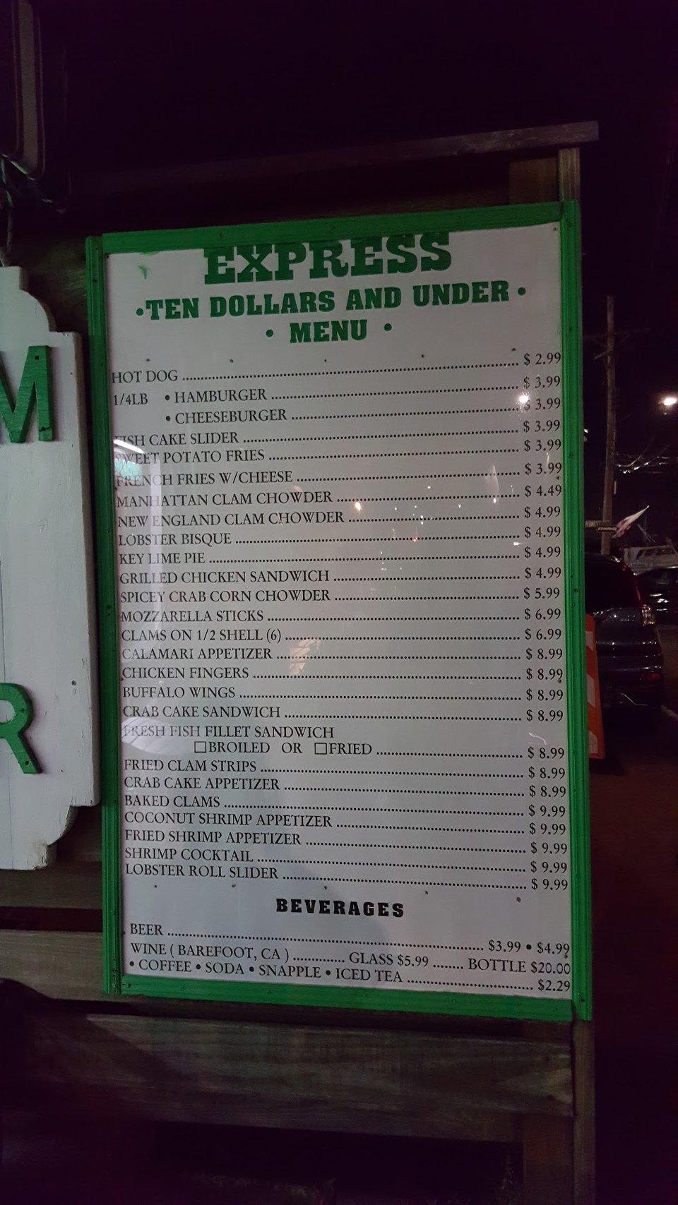 Printed menu showing chowder, clams, and crab.